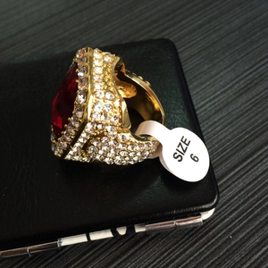 Hip hop square ring in gold finish with large red gemstone and micro-pave crystals