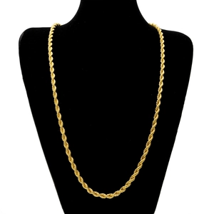Detailed view of the 6mm gold-plated twisted rope chain on a black velvet neck bust