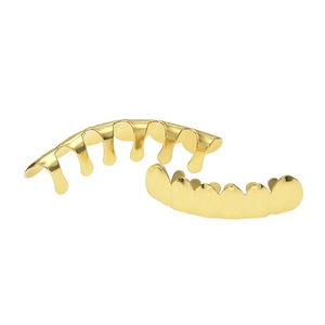 Polished gold-plated hip hop grillz set featuring top and bottom rows with reflective finish