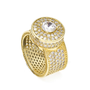 Macro shot of gold hip hop ring showing intricate pavé setting and grid hollow interior