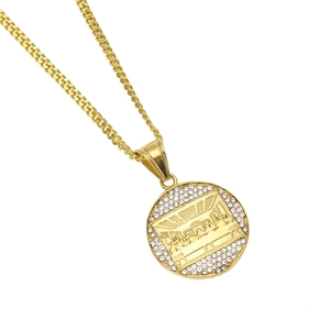 Gold The Last Supper pendant necklace with iced out stones and heavy cuban link chain