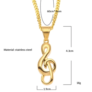 Collier pendentif note de musique clé de sol en acier doré avec chaîne cubaine de 60cm