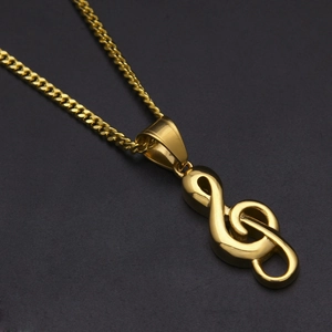 Collier avec pendentif clé de sol doré sur une chaîne à maillons polis pour hommes et femmes