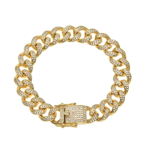 Detailed macro view of 13mm gold plated Cuban link bracelet with iced out cubic zirconia