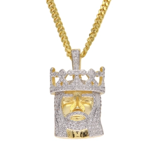 Detailed close-up of hip hop Jesus pendant with micro-pave zircons and gold plating