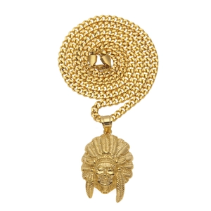 Detailed view of golden hip hop necklace with Native American chief feather pendant