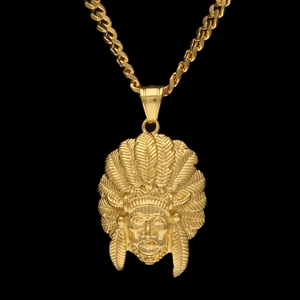 Detailed close-up of golden Indian tribal chief pendant with intricate feather textures
