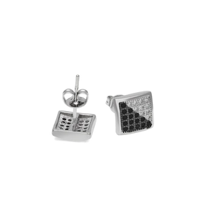 Detailed macro view of square stud earrings with black and white zircon stone inlay