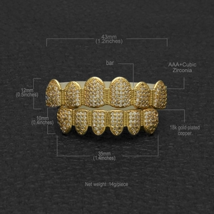 Hip hop style gold-plated grillz set with micro-pave cubic zirconia on gray background