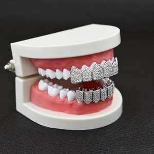 Close-up of hip hop grillz set with silver plating and micro-pave cubic zirconia stones