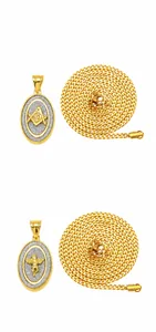Macro view of gold pendants featuring Mason symbol and cherub with silver glitter texture
