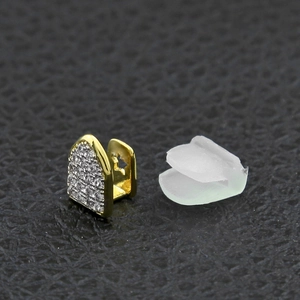 Hip hop gouden enkele tand grillz met zirkonia steentjes en ster patroon uitsnijding