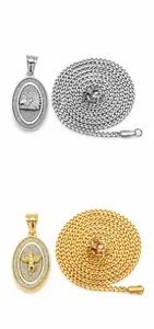 Detail view of hip-hop oval pendants with embossed Pharaoh and Angel on cuban chains
