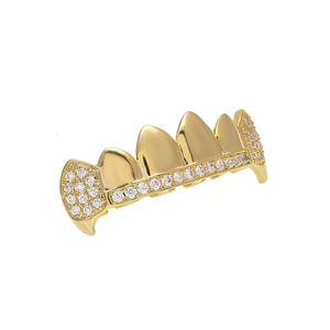 Detailed macro view of hip hop gold-plated grillz with micro-paved cubic zirconia stones
