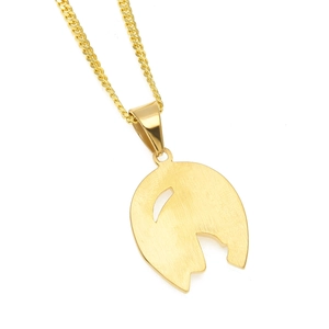 Close-up of hiphop gold horse head pendant with brushed texture on Cuban link chain