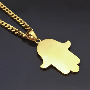 Men's gold Hamsa Hand pendant necklace with brushed stainless steel finish and Cuban chain