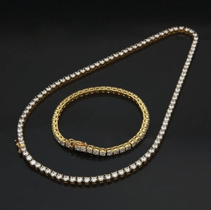 Detailed macro view of 4mm gold tennis chain set with high-quality cubic zirconia stones