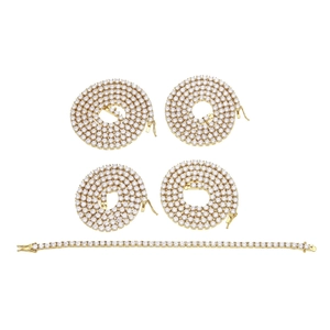 Close-up of 4mm gold-plated tennis chains with prong-set round cubic zirconia stones
