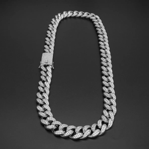 Detailed view of 20mm iced out Cuban link chain with micro paved zircon stones
