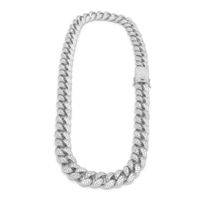 Macro detail of 20mm silver Cuban link chain with micro-pave cubic zirconia crystals