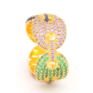 Detail of gold-plated hoop earrings featuring multi-colored micro-pave zircon stones