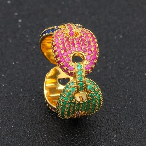 Macro shot of hip hop style chain ring with multi-color pave-set zircon stones