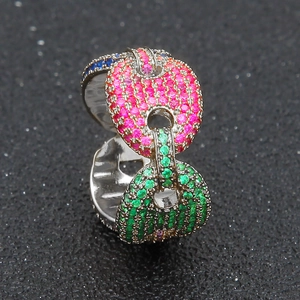 Macro shot of hip hop chain ring with colorful micro-paved cubic zirconia stones