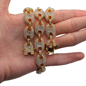 Hip hop style gold coffee bean necklace featuring sparkling pavé crystals and square clasp