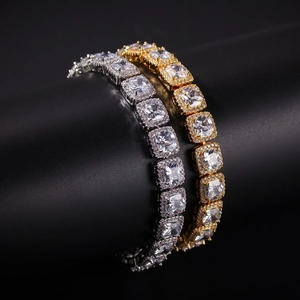 Detail of iced out square zircon hip hop bracelet in gold and silver finish