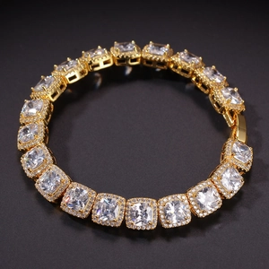Detailed close-up of golden iced out hip-hop chain with square cubic zirconia links