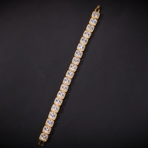 Detail of gold-plated tennis bracelet featuring square cubic zirconia and micro-pave setting