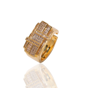 Detailed macro view of the multi-layer tiered gold ring featuring micro-pave zircon crystals
