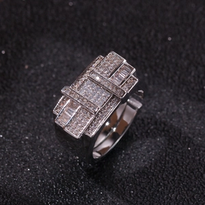 Macro shot of a silver geometric wide ring featuring pave-set white cubic zirconia stones