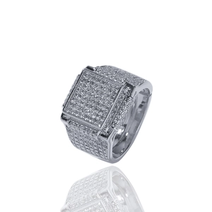 Macro detail of silver square hip-hop ring with micro-paved sparkling cubic zirconia