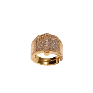 Macro view showing the wide gold plated surface and dense pavé zircon setting on this ring