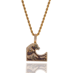 Detail shot of Great Wave pendant with blue micro-pave zircons and golden rope chain