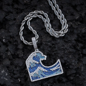 Micro-paved wave pendant necklace with blue and white zircons on a black stone base