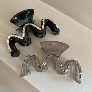Pinces à cheveux ondulées scintillantes en noir et gris transparent avec strass