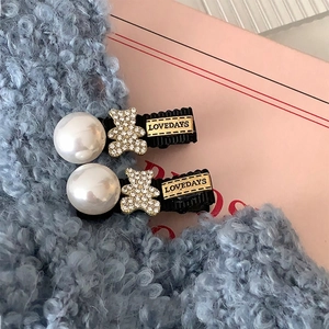 French vintage style rhinestone bear hair clips with white pearls and Lovedays gold tag