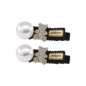 French vintage rhinestone bear hair clips with white pearls and black ribbon base