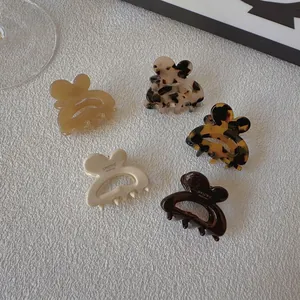 Five-piece set of handmade French style acetate rabbit hair claws in assorted neutral colors