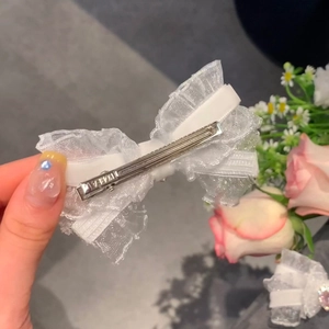 Barrette à cheveux élégante avec nœud en dentelle blanche et pince bec de canard