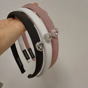 Three-color satin headband set with luxury rhinestone hearts in black, white, and pink
