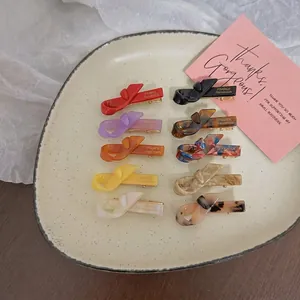10-piece set of elegant handmade acetate hair clips in solid colors and tortoise patterns