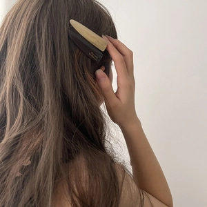 Set of 2 geometric acetate hair clips in beige and brown with Barrette La France gold text