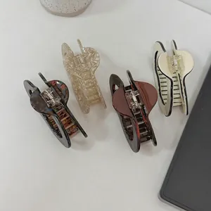 Elegant acetate cloud hair claws set in tortoiseshell and beige for thick hair styling