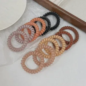 Élastiques à cheveux spirales mats aux tons terreux pour femmes, style cordon de téléphone