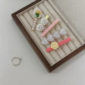 French style 5-piece hair clip set with cream pearls and tulips in a wooden jewelry box