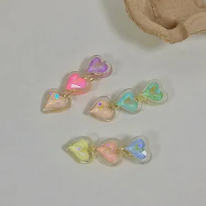Iridescent candy color heart hair clips set made of translucent resin material
