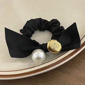 French vintage black bow hair tie with elegant white pearl and gold metal charm accessory
